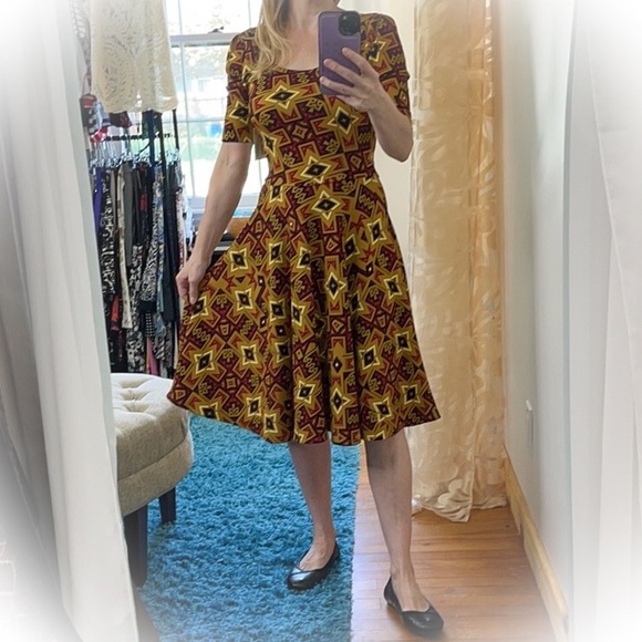 💕NWT Lularoe Nicole Dress Mustard Colored with Fun Star patterns💕 - Picture 2 of 12